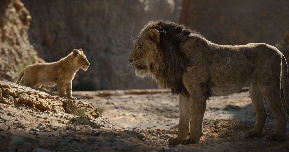 A picture of the live action Scar and Simba looking at one another